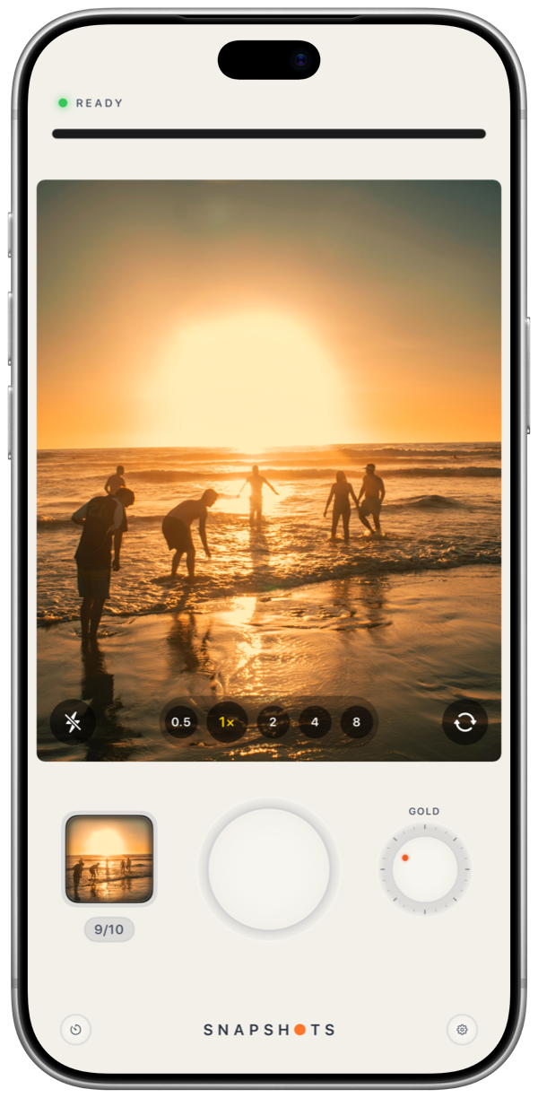 The Snapshots camera on an iPhone: viewfinder, shutter, film dial and film counter.
