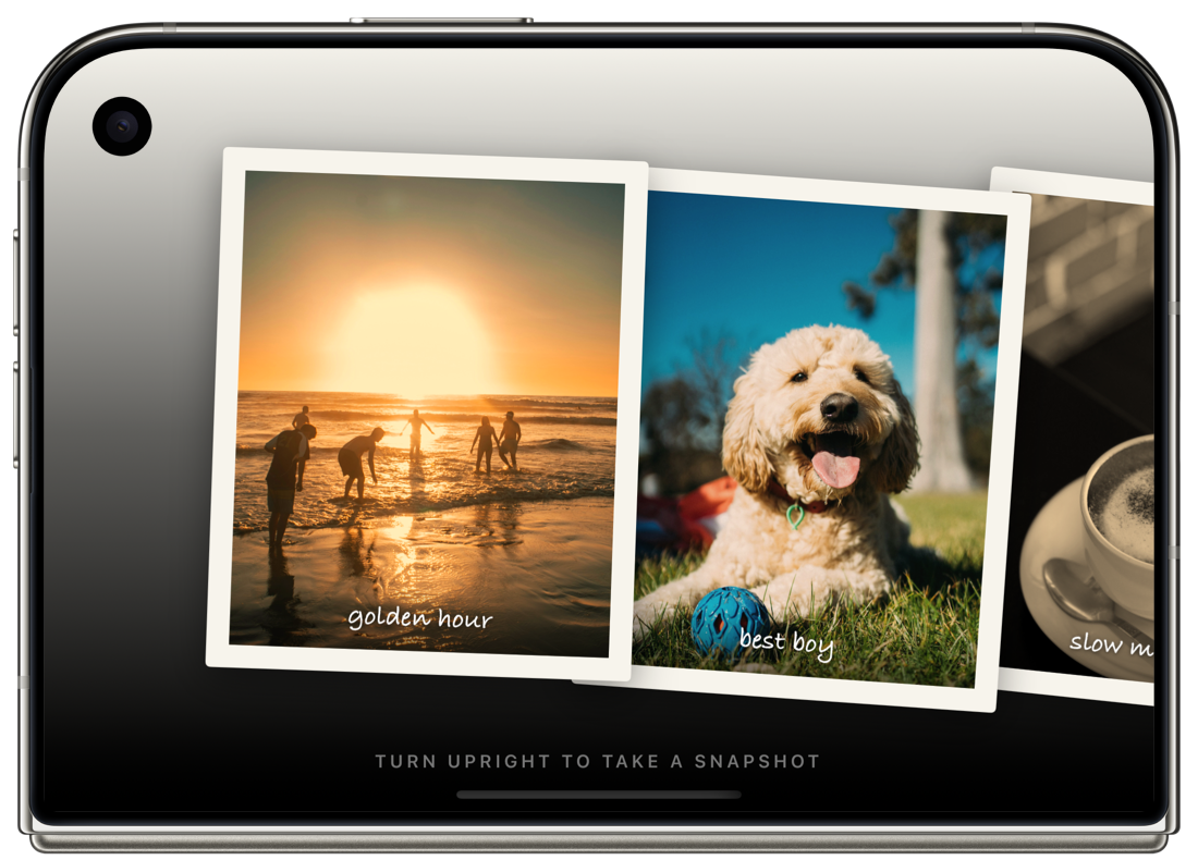 Snapshots on the front display of a closed iPhone Duo turned on its side: prints laid out in an overlapping row.